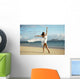 Beautiful Female Ballet Dancer On Beach Wearing White Flowing Fabric Wall Mural