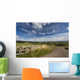 A Country Road With A Hilly Landscape Wall Mural