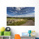 A Country Road With A Hilly Landscape Wall Mural