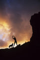 Hawaii, Silhouette Of A Woman Stretching On A Mountain Top At Sunset Wall Mural