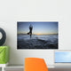 Fit Young Girl On The Beach Doing Yoga On The Rocky Coastline Wall Mural