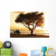 Beautiful Sunset Over The Ocean With A Couple Sitting On A Bench Wall Mural