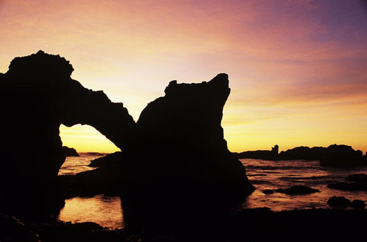 Natural Stone Arch Silhouetted At Sunset Wall Mural