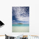 Turquoise Water And Blue Skies Surround Isolated Isalnd Wall Mural