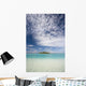 Turquoise Water And Blue Skies Surround Isolated Isalnd Wall Mural