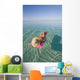 French Polynesia, Tahiti, Moorea, Woman Floating In Water Wall Mural