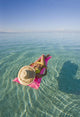French Polynesia, Tahiti, Moorea, Woman Floating In Water Wall Mural