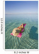 French Polynesia, Tahiti, Moorea, Woman Floating In Water Wall Mural