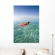 French Polynesia, Tahiti, Moorea, Woman Floating In Water Wall Mural