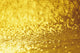 Closeup Of Golden Shimmering Reflections Off Water Wall Mural