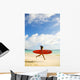 Young Japanese Woman Running On Beach While Holding A Red Surfboard Wall Mural