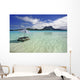 Picnic Table And Umbrella In Clear Lagoon Water Wall Mural