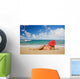 Hawaii, Woman Sitting On The Beach At A Remote Tropical Location Wall Mural
