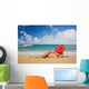 Hawaii, Woman Sitting On The Beach At A Remote Tropical Location Wall Mural