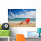 Hawaii, Woman Sitting On The Beach At A Remote Tropical Location Wall Mural