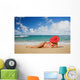 Hawaii, Woman Sitting On The Beach At A Remote Tropical Location Wall Mural