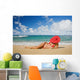 Hawaii, Woman Sitting On The Beach At A Remote Tropical Location Wall Mural