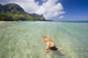 Hawaii, Kauai,Tunnels Beach, Woman Floating In The Ocean Wall Mural