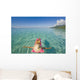 French Polynesia, Tahiti, Moorea, Woman Floating In Water Wall Mural