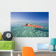 French Polynesia, Tahiti, Moorea, Woman Floating In Water Wall Mural