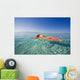 French Polynesia, Tahiti, Moorea, Woman Floating In Water Wall Mural