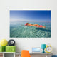 French Polynesia, Tahiti, Moorea, Woman Floating In Water Wall Mural