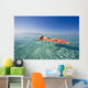 French Polynesia, Tahiti, Moorea, Woman Floating In Water Wall Mural