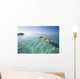 French Polynesia, Tahiti, Moorea, Woman Floating In Water Wall Mural