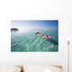French Polynesia, Tahiti, Moorea, Woman Floating In Water Wall Mural