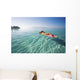 French Polynesia, Tahiti, Moorea, Woman Floating In Water Wall Mural