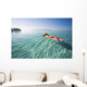 French Polynesia, Tahiti, Moorea, Woman Floating In Water Wall Mural
