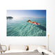 French Polynesia, Tahiti, Moorea, Woman Floating In Water Wall Mural