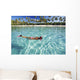 French Polynesia, Moorea, Woman Free Diving In Turquoise Ocean Wall Mural