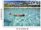 French Polynesia, Moorea, Woman Free Diving In Turquoise Ocean Wall Mural
