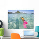 French Polynesia, Moorea, Woman Free Diving In Turquoise Ocean Wall Mural