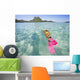 French Polynesia, Moorea, Woman Free Diving In Turquoise Ocean Wall Mural