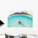French Polynesia, Moorea, Woman Free Diving In Turquoise Ocean Wall Mural