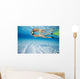 French Polynesia, Moorea, Woman Free Diving In Turquoise Ocean Wall Mural