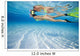 French Polynesia, Moorea, Woman Free Diving In Turquoise Ocean Wall Mural