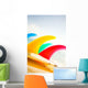 Colorful Surfboards Fins, Bright Sunny Sky In Background Wall Mural