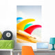 Colorful Surfboards Fins, Bright Sunny Sky In Background Wall Mural