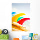 Colorful Surfboards Fins, Bright Sunny Sky In Background Wall Mural