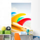 Colorful Surfboards Fins, Bright Sunny Sky In Background Wall Mural