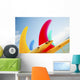 Colorful Surfboards Fins, Bright Sunny Sky In Background Wall Mural
