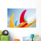 Colorful Surfboards Fins, Bright Sunny Sky In Background Wall Mural