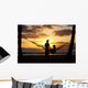 Silhouette Of Woman In Hammock And Man Standing Next To Her Wall Mural