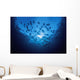 Ecuador, School of Cownose Rays swimming close to water surface Wall Mural