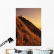 USA, Hawaii, Oahu, Mountain Bbiker at top of hill at sunset Wall Mural