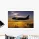 USA, Silhouette of airplane in sunset sky Wall Mural
