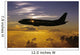 USA, Silhouette of airplane in sunset sky Wall Mural